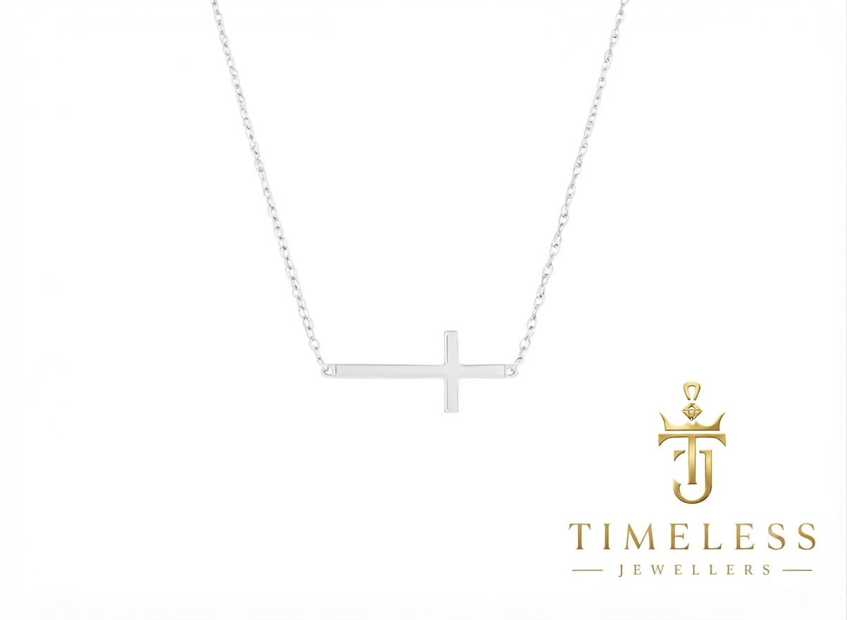 Sideways silver cross